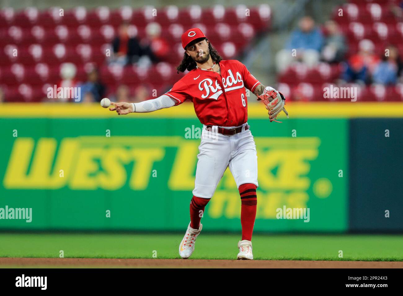 Cincinnati Reds' Jonathan India fields the ball and throws during a