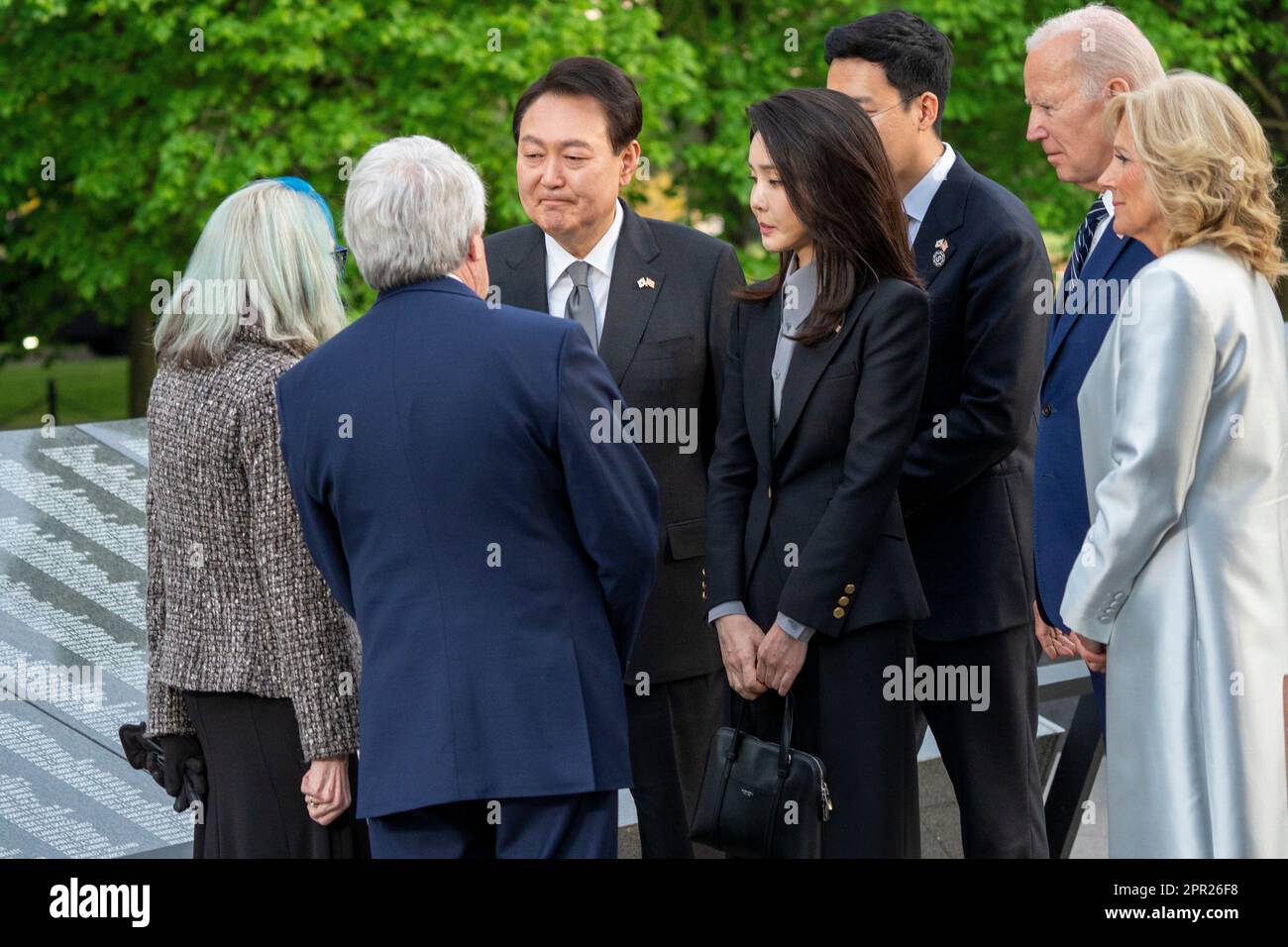Washington, DC, USA. 25th Apr, 2023. President Joe Biden and First Lady Jill Biden with President Yoon Suk Yeol of the Republic of Korea and Mrs. Kim Keon Hee, First Lady of the Republic of Korea, talk with with Judy Wade, the niece of Medal of Honor recipient Corporal Luther Story, and her spouse Joseph Wade during a visit to the Korean War Memorial in Washington, DC, USA, 25 April 2023. Tomorrow President Biden will host a State Visit for President Yoon Suk Yeol of the Republic of Korea. Credit: Shawn Thew/Pool via CNP/dpa/Alamy Live News Stock Photo