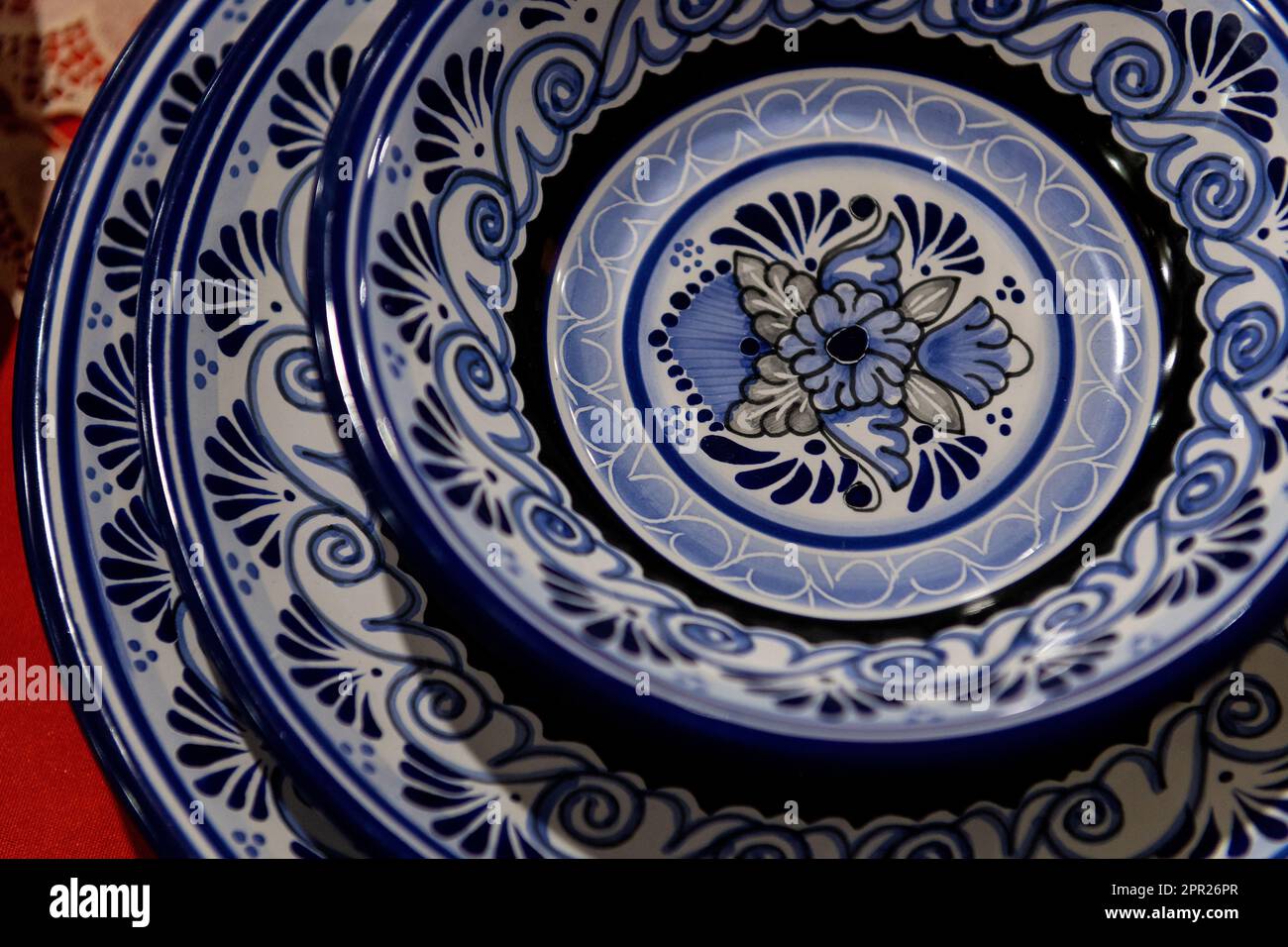 Ceramic food plates of talavera pottery style, Puebla, Mexico. Stock Photo