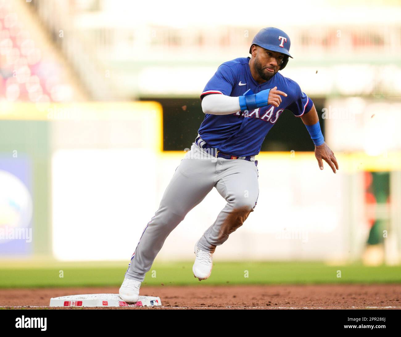 Texas Rangers' Ezequiel Duran rounds the bases in a baseball game