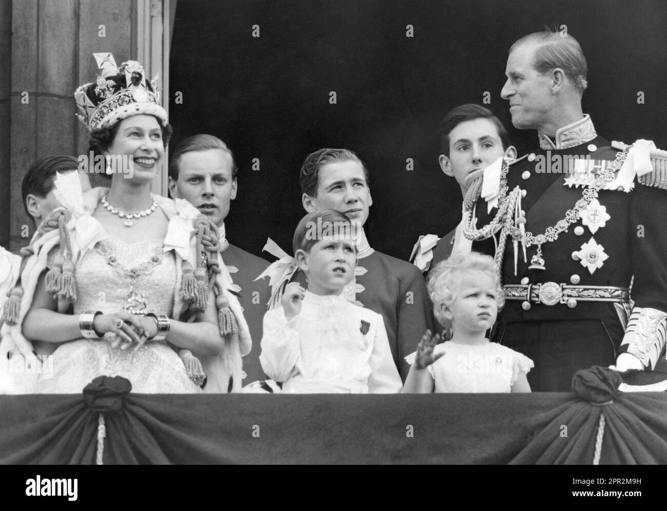File photo dated 02/06/53 of Queen Elizabeth II, Prince Charles, Princess Anne and the Duke of Edinburgh on the balcony at Buckingham Palace after the coronation at Westminster Abbey. Prince Charles became the first child in British history to witness their mother's coronation as sovereign when he attended Queen Elizabeth II's 1953 ceremony at the age of just four. Issue date: Wednesday April 26, 2023. Stock Photo