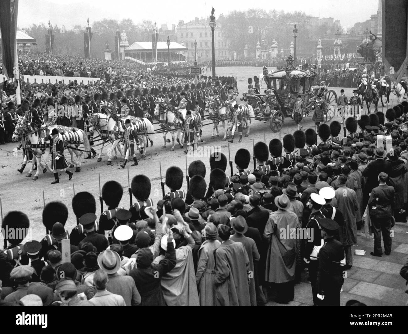 File photo dated 12/05/37 of the then Duke and Duchess of York in a carriage on The Mall leaving for Westminster Abbey, for the Coronation ceremony, after which they became King George VI and Queen Elizabeth. King Charles III's grandfather George VI was crowned with his consort Queen Elizabeth in the aftermath of the abdication crisis which rocked the monarchy. Issue date: Wednesday April 26, 2023. Stock Photo