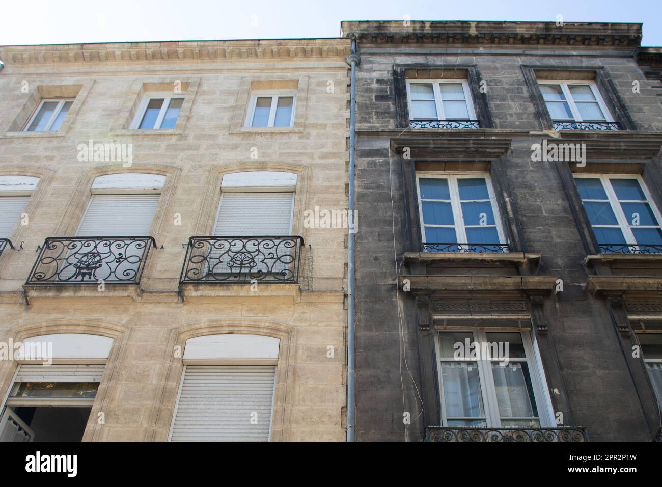 Before and After building facade cleaning stones wall with large