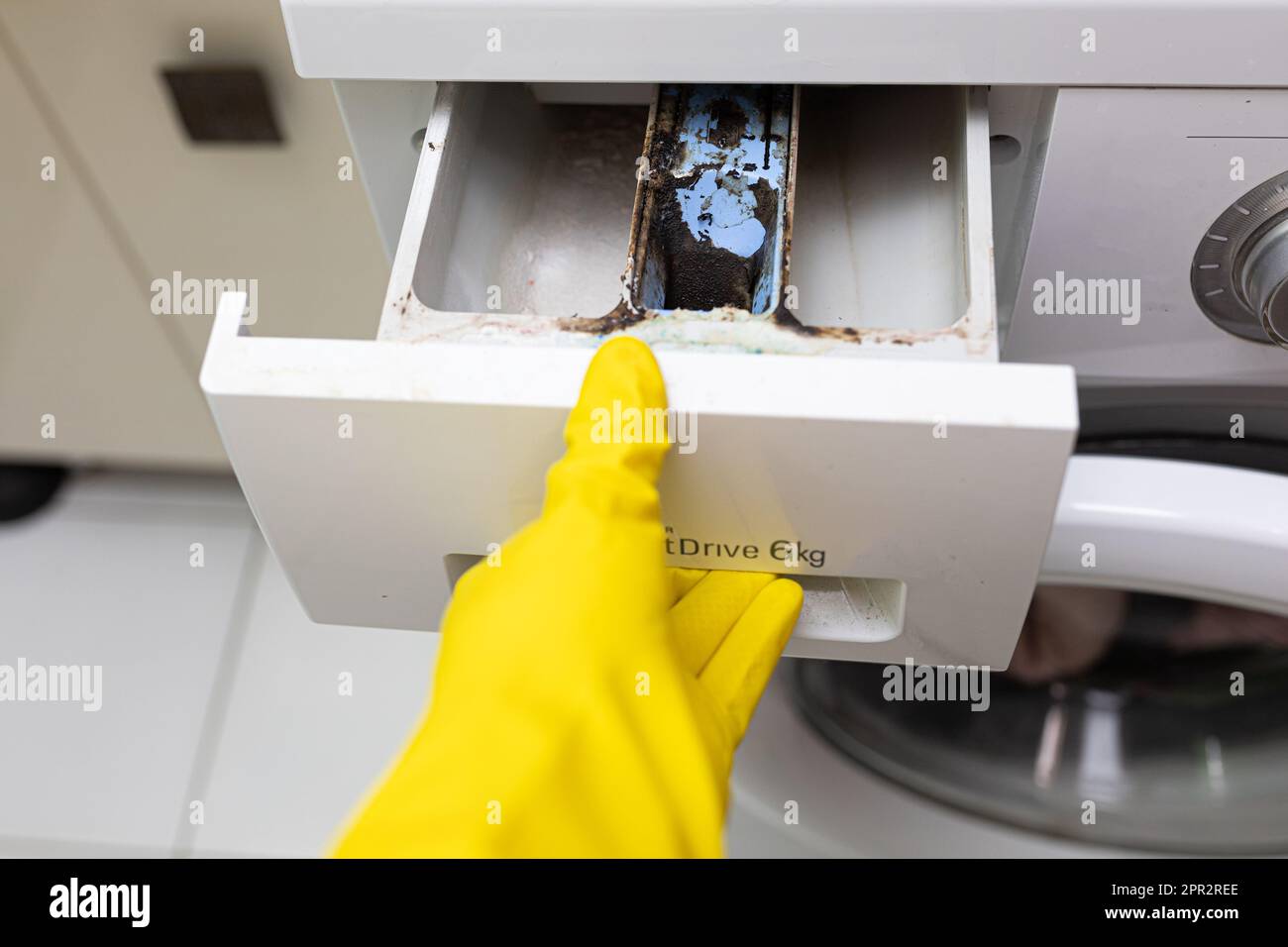 Dirty, moldy and rusty washing machine dispenser drawer for detergent