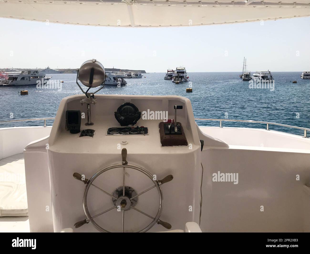 Captain's cabin on a ship, boat, cruise liner with a steering wheel