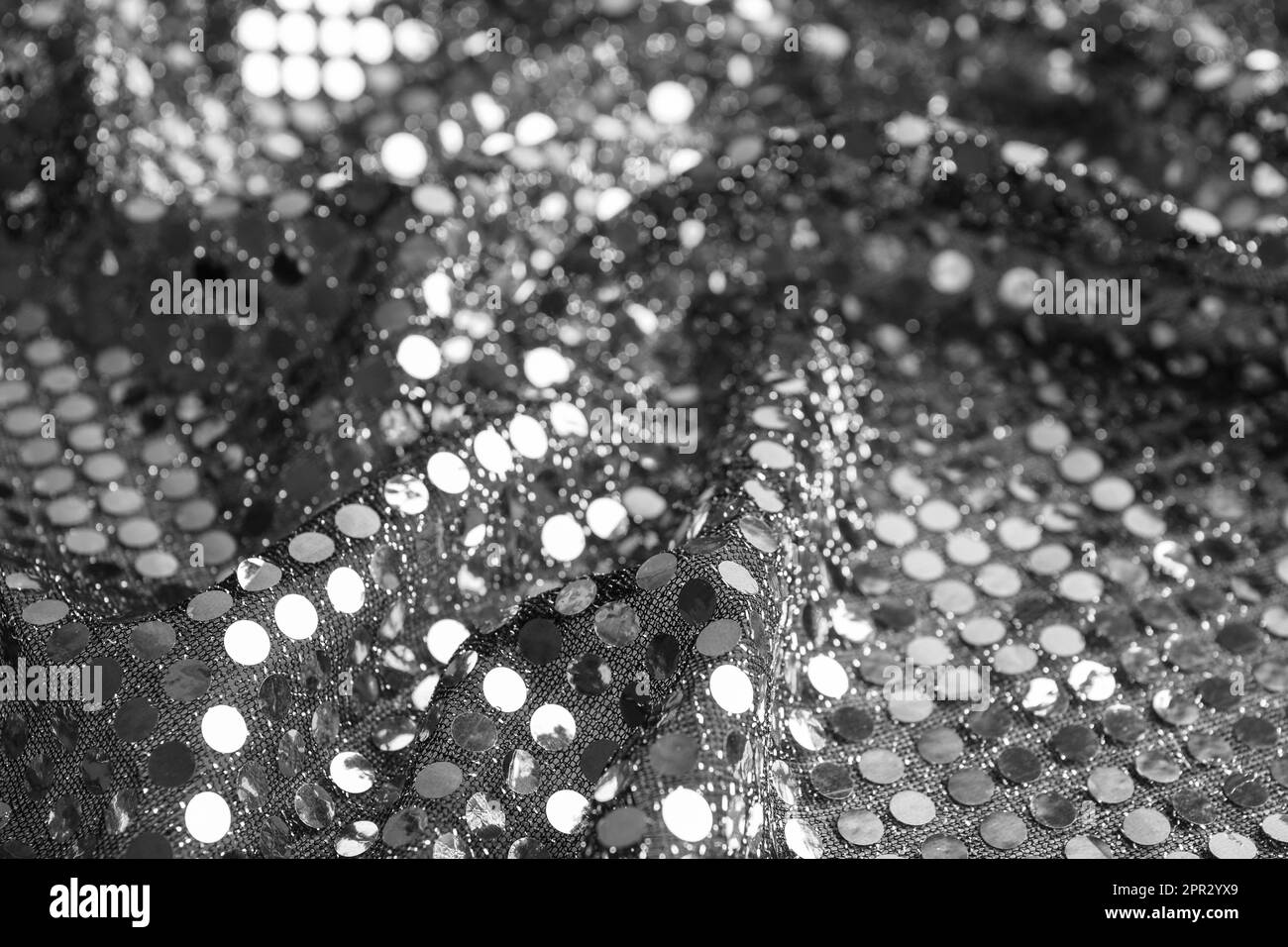 Texture of beautiful silver fabric with paillettes as background, closeup Stock Photo