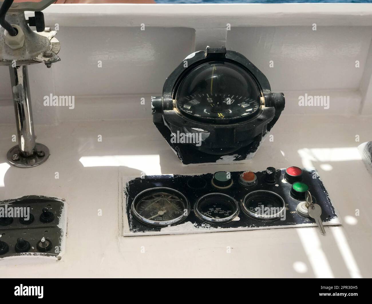The dashboard is on a boat, ship, maritime transport with a large glass