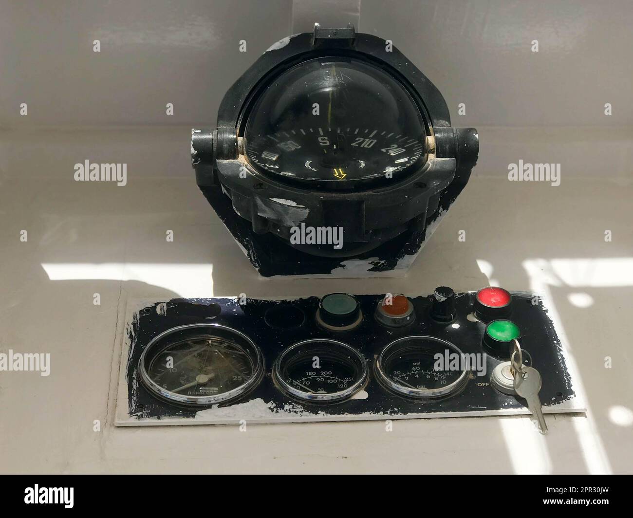 Instrument panel on a boat, ship, maritime transport with a compass, a