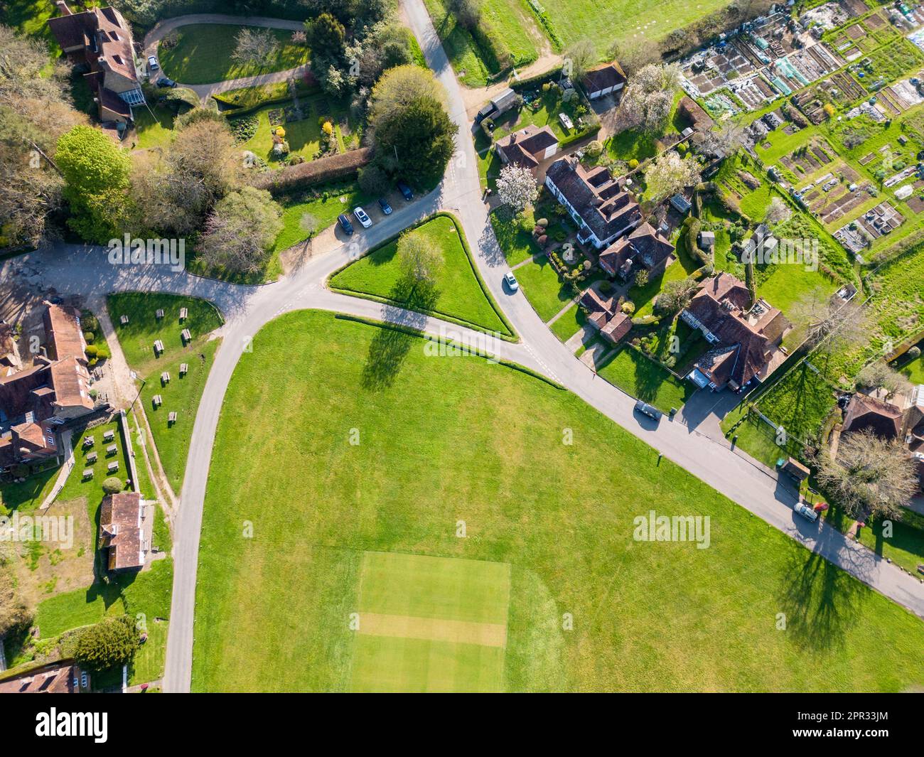 aerial view of the houses around the large green in lurgashall village in west sussex Stock Photo