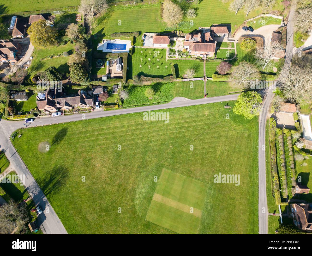 aerial view of the houses around the large green in lurgashall village in west sussex Stock Photo