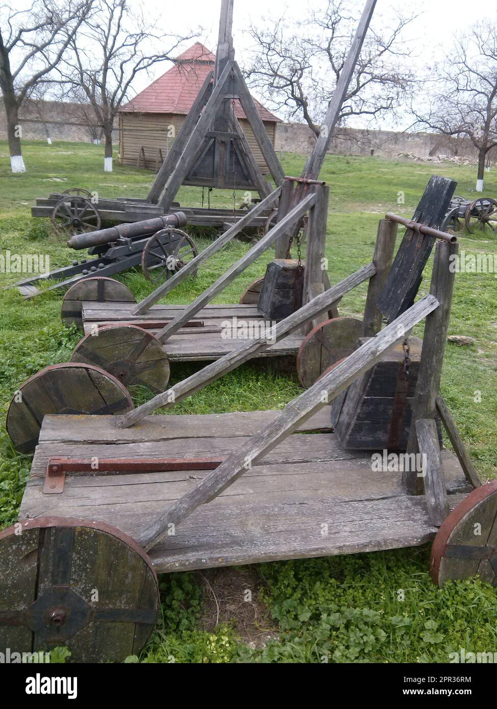 Medieval historical reconstruction, wooden catapults, balistas. Medieval siege weapon.  Stock Photo