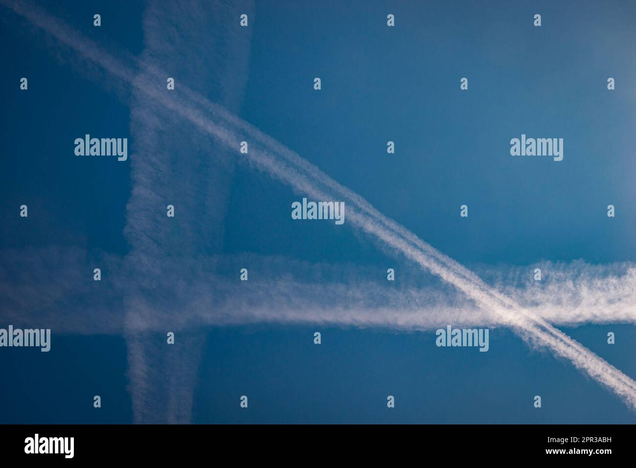 Blue contrails hi-res stock photography and images - Alamy