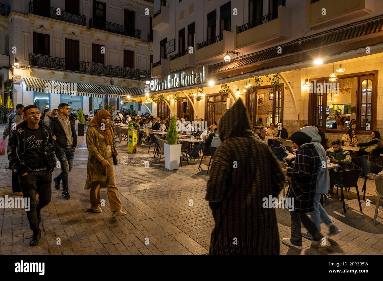 People strolling through the Small Souk Square at night. Stock Photo