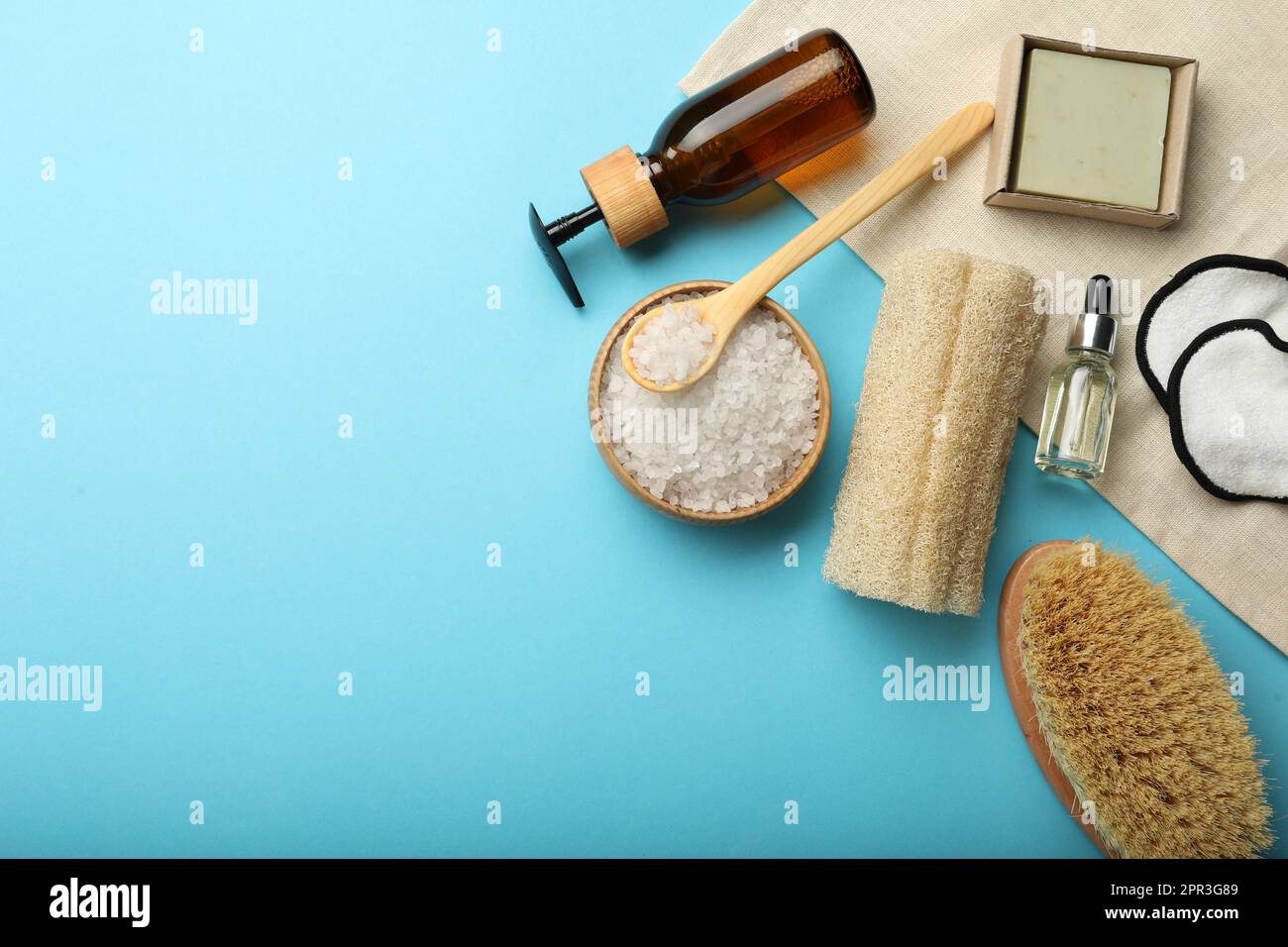 Flat lay composition with eco friendly products on light blue ...