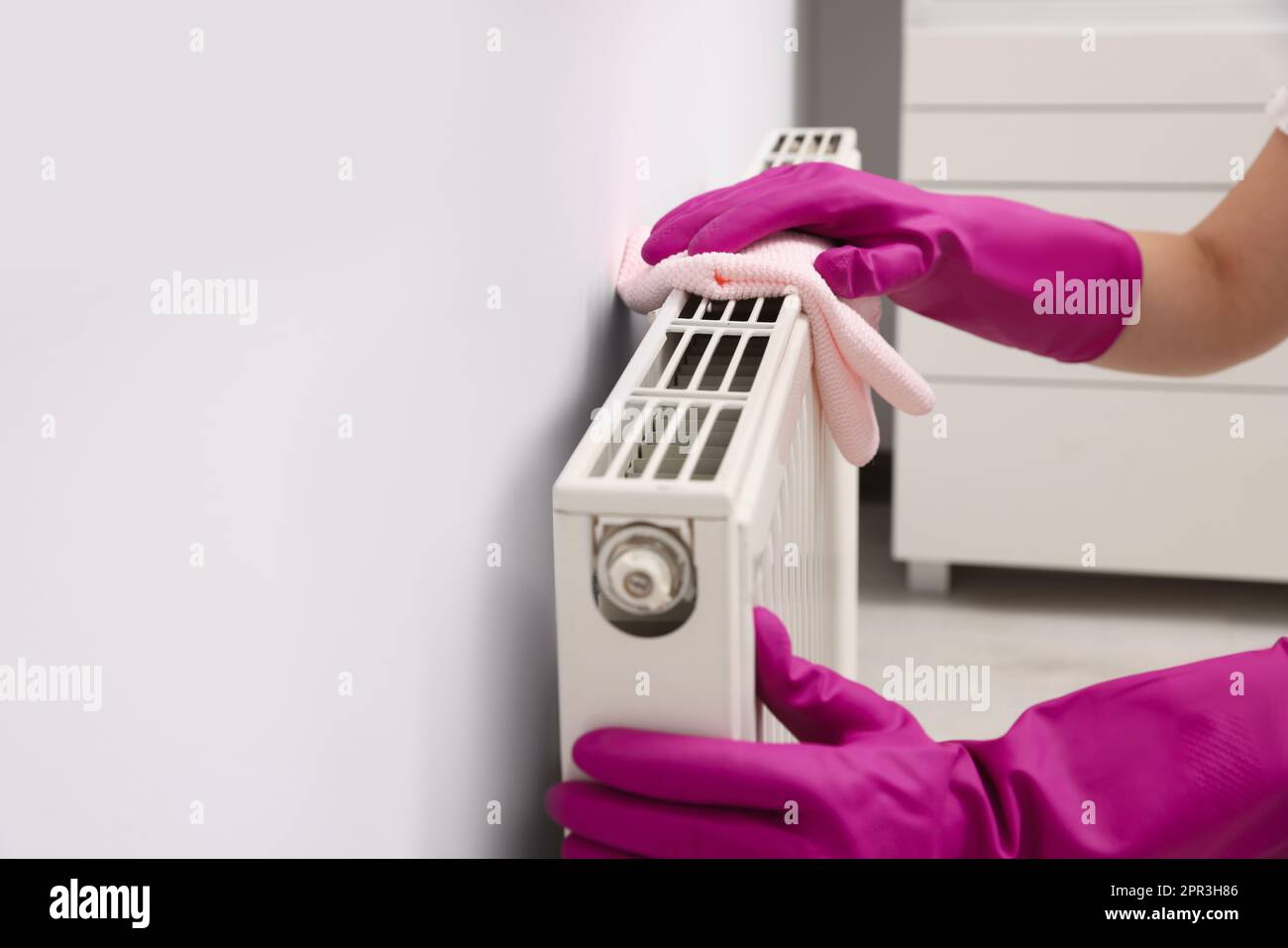 Someone Dusting A Radiator Cleaning radiator home hi-res stock photography and images - Alamy