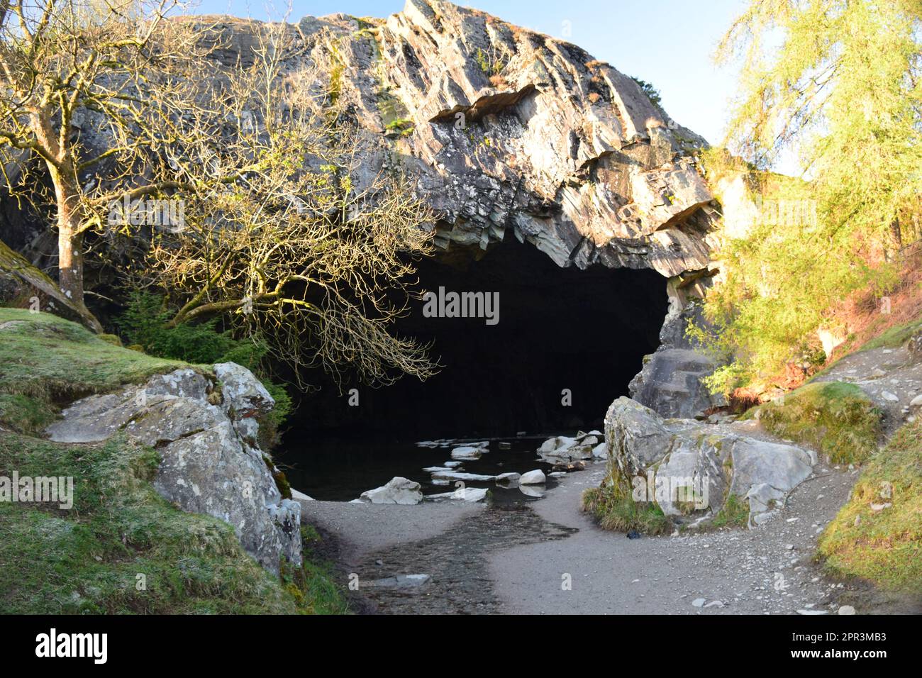 The gaping mouth of Rydal cave, looking in and looking out. Stock Photo