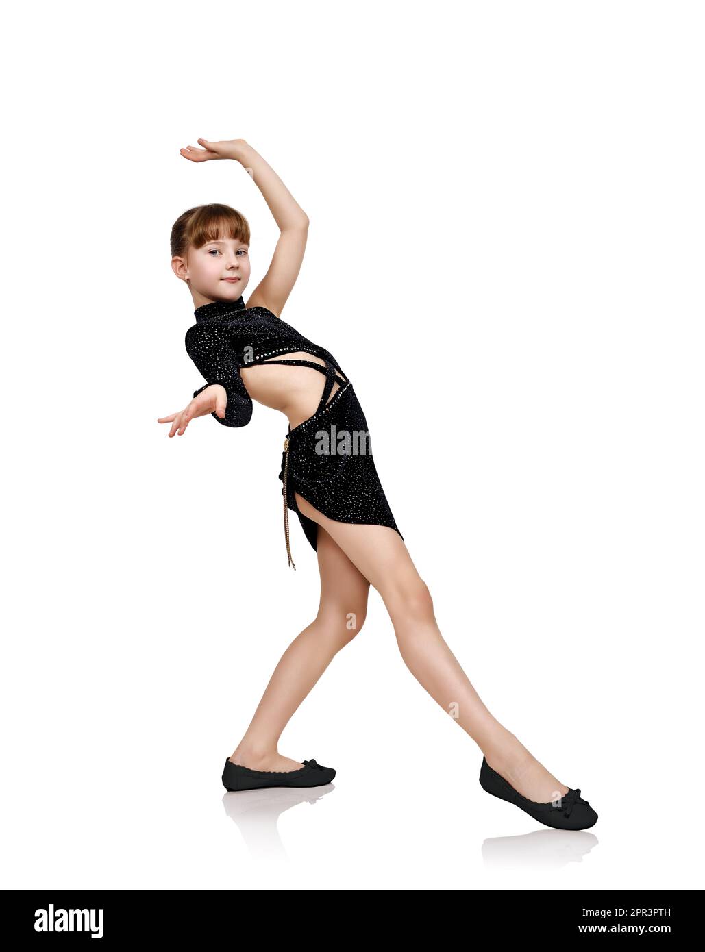 Young girl dancing on a white background Stock Photo