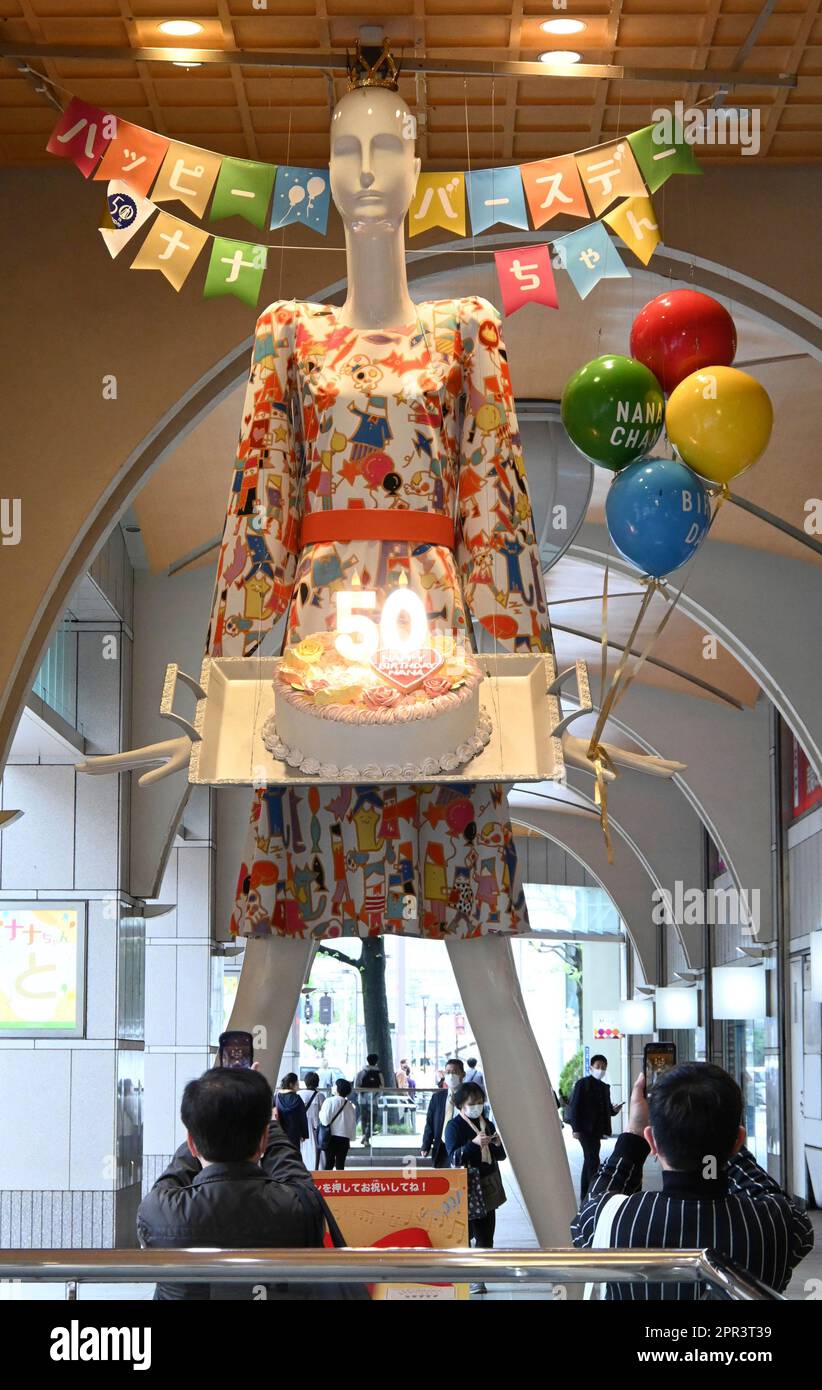 Nana-chan, a fashionable giant mannequin stands in front of the Meitetsu  Department store in Nagoya, Aichi Prefecture on April 26, 2023. The  6.10-meter-high doll becomes the 50th birthday and she changes her