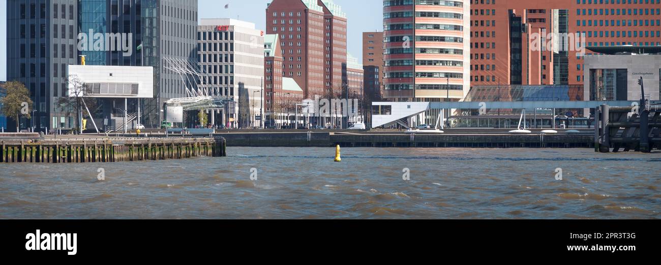 Rotterdam, Netherlands - Bridgewatcher's House and quayside development by Bolles Wilson over River Maas Stock Photo