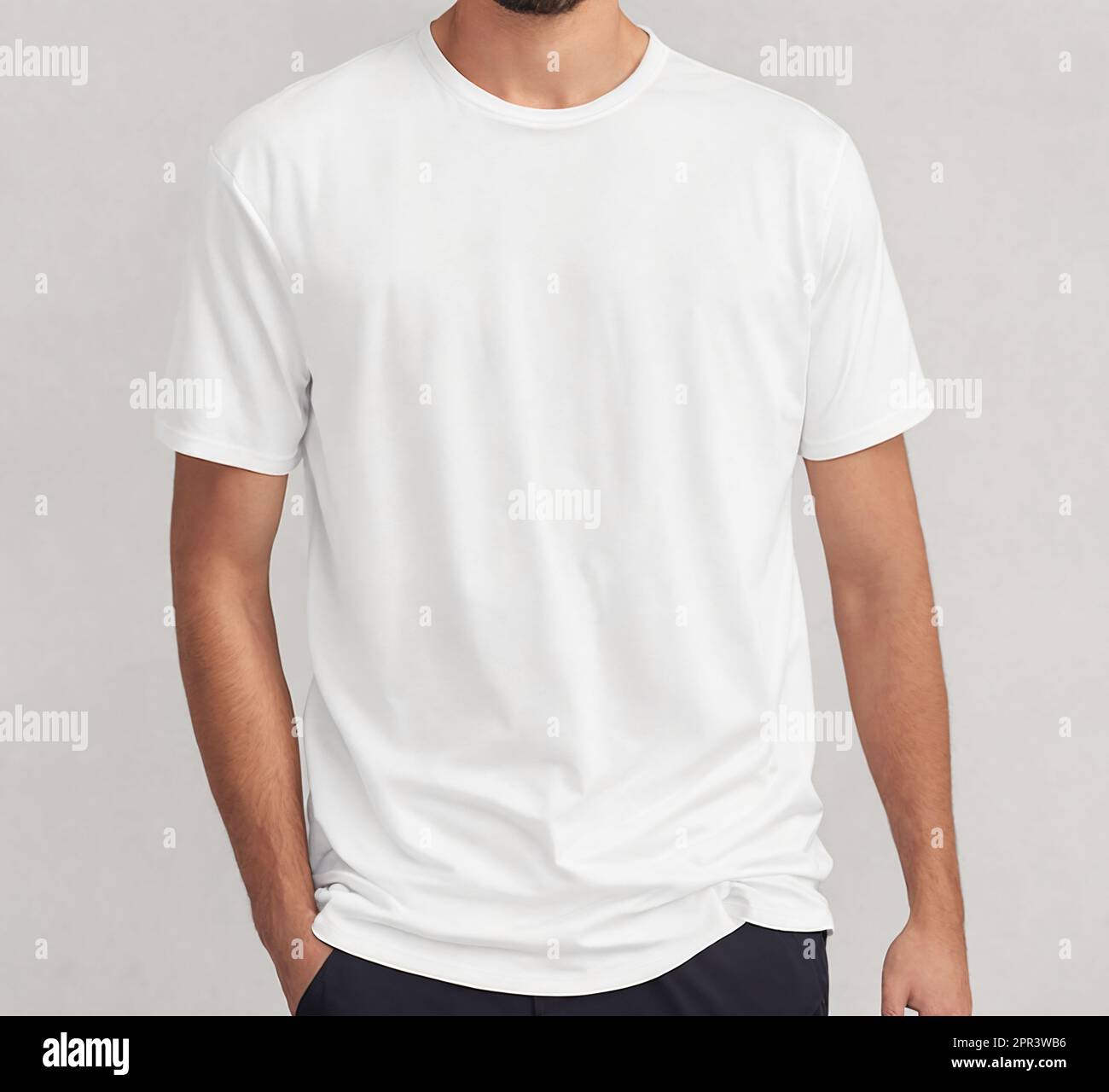 Young man wearing a white t-shirt on grey background. Template or mockup for clothing design Stock Photo