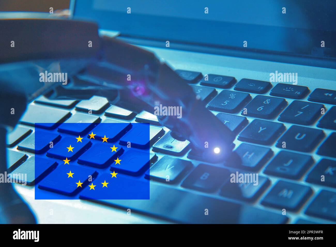 Robotic hand typing on a keyboard - Robotic Hand Typing On A Keyboard With The European Flag Concept Of Investments On Artificial Intelligence From European Countries 2PR3WFR 