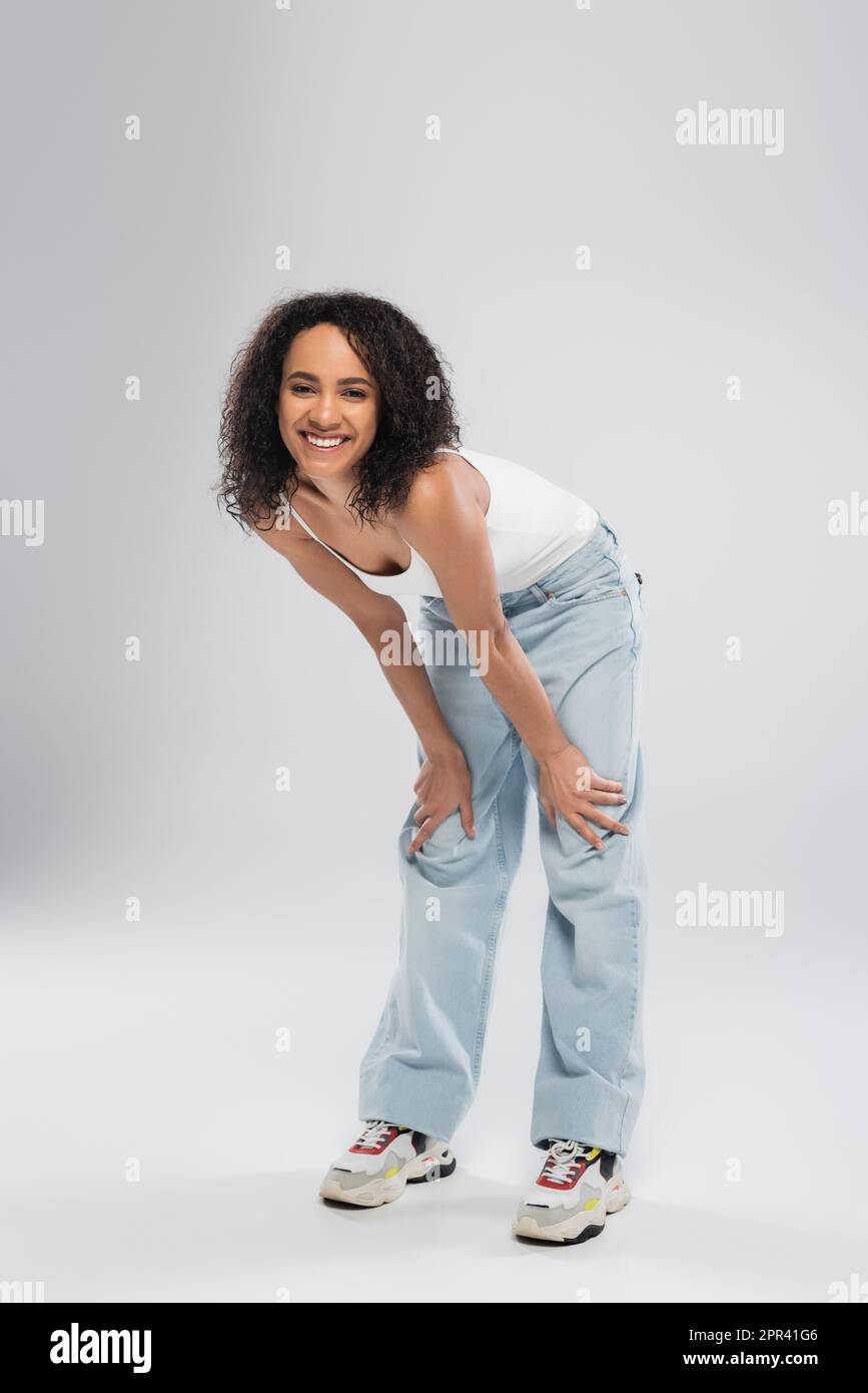 Woman in blue jeans hi-res stock photography and images - Alamy