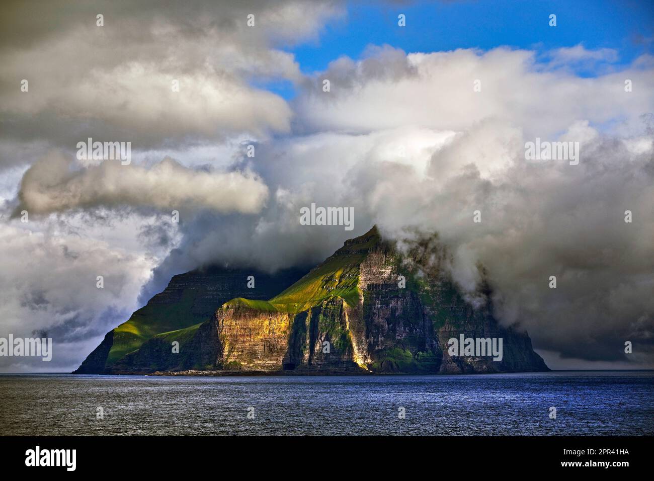 island Kalsoy in Atlanic Sea with clouds, Faroe Islands, Kalsoy Stock Photo