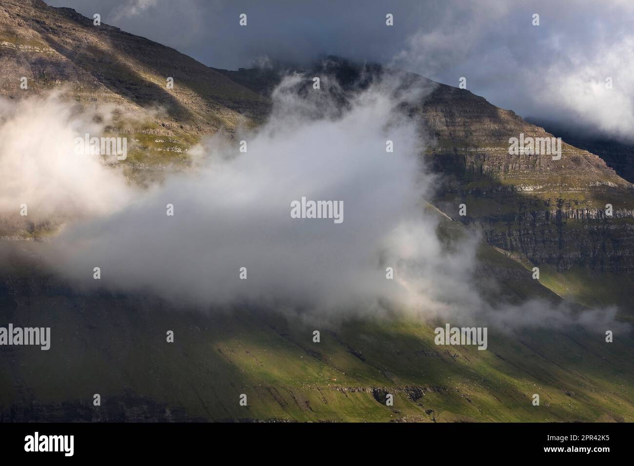 cloud over west coast of island Kunoy, Faroe Islands, Kunoy Stock Photo