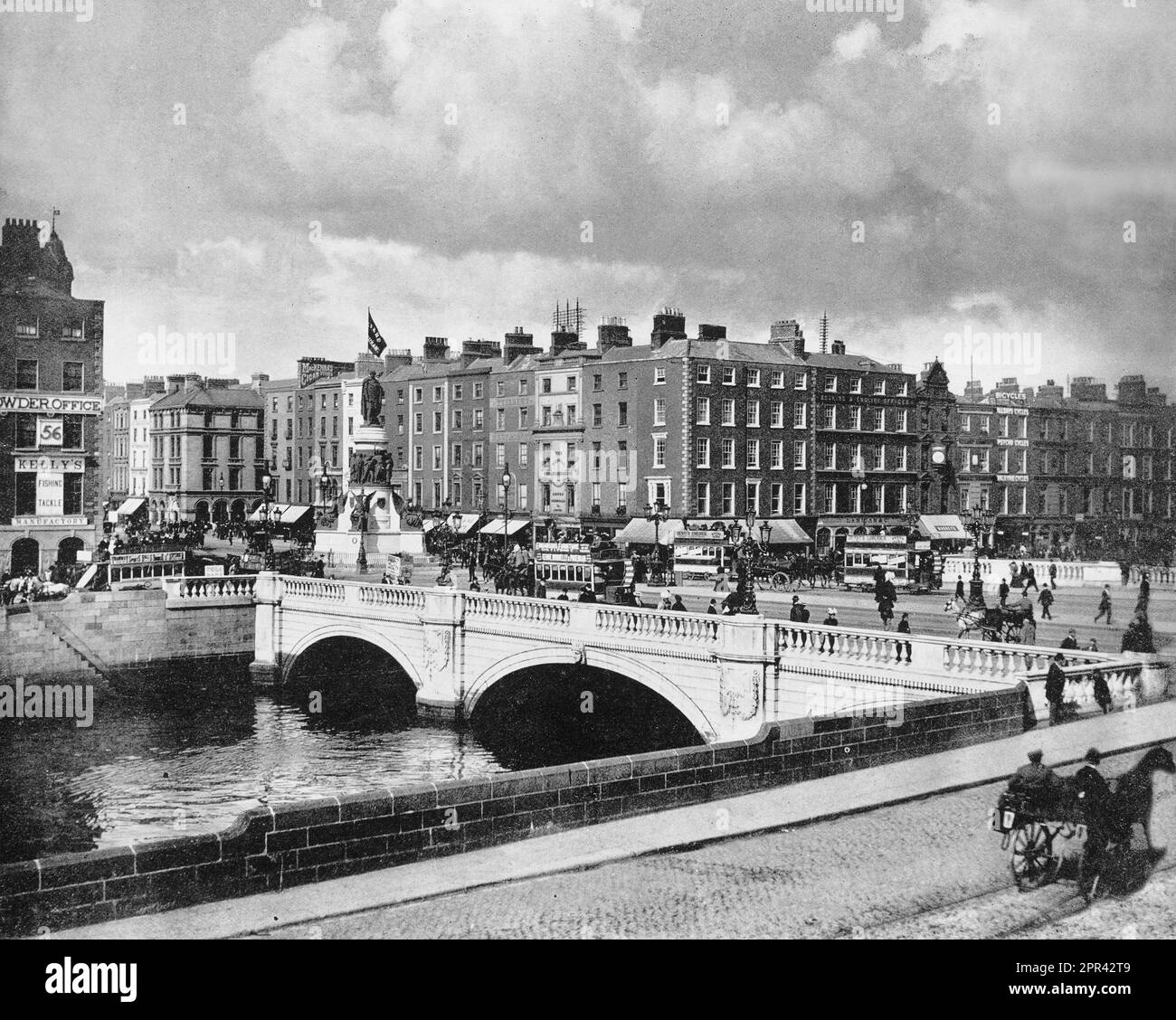 A late 19th century photograph of the busy, O'Connell Bridge crossing the River Liffey in Dublin, Ireland. The original bridge (named Carlisle Bridge after the then Lord Lieutenant of Ireland – Frederick Howard, 5th Earl of Carlisle) was designed by James Gandon, and built between 1791 and 1794. Originally humped and narrower, the bridge was reconstructed and widened between 1877 and 1880. Stock Photo