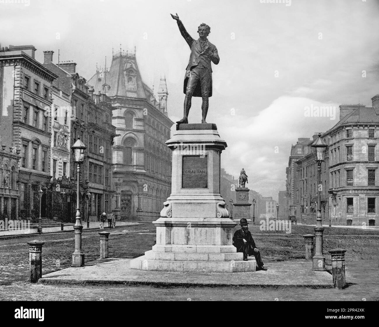 A late 19th century photograph of the Grattan Statue in College Green, Dublin, Ireland.  Henry Grattan 1746-1820) was an Irish politician and lawyer, a Member of the Irish Parliament (MP) from 1775 to 1801 and a Member of Parliament (MP) in Westminster from 1805 to 1820, who campaigned for legislative freedom for the Irish Parliament in the late 18th century from Britain. Described as a superb orator, he demanded that Ireland should be an independent nation, though he always insisted that Ireland would remain linked to Great Britain by a common crown and by sharing a common political tradition Stock Photo