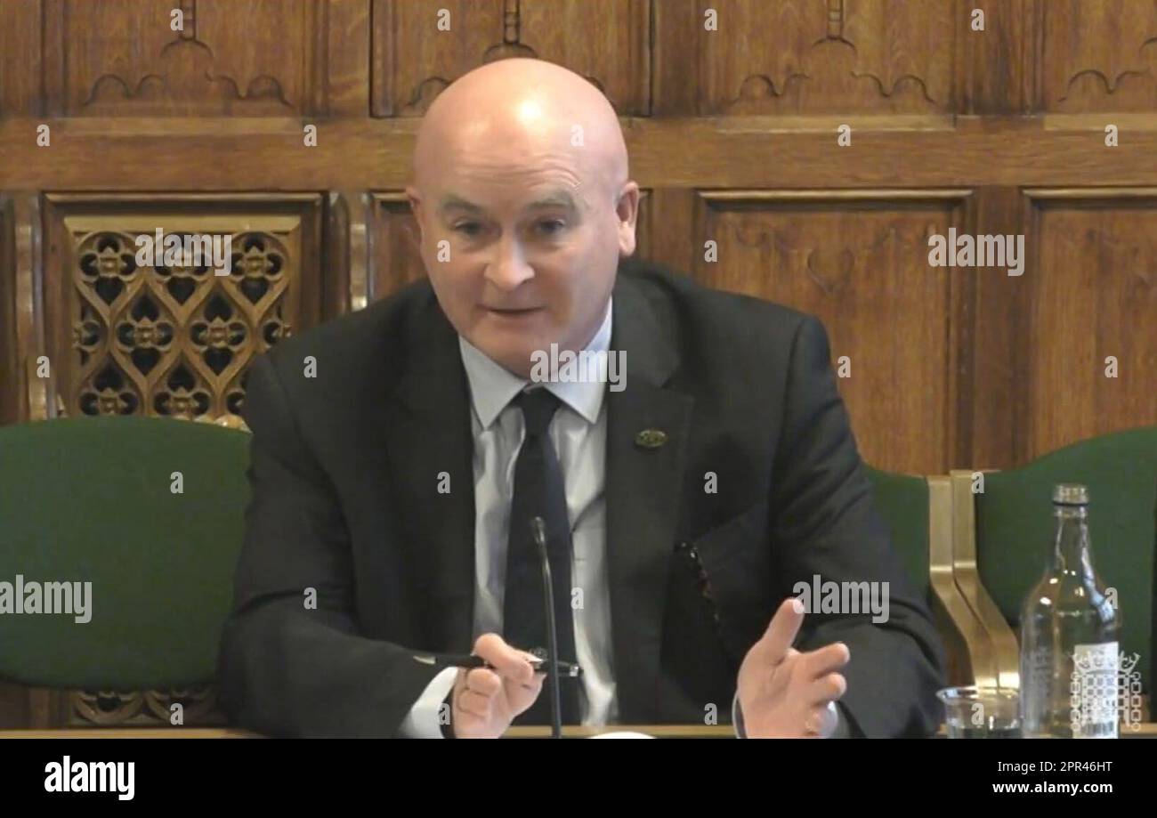 Mick Lynch, general secretary of the Rail, Maritime and Transport union (RMT) , answering questions in front of the Transport Select Committee in the House of Commons, London, on the subject of minimum service levels for rail. Picture date: Wednesday April 26, 2023. Stock Photo