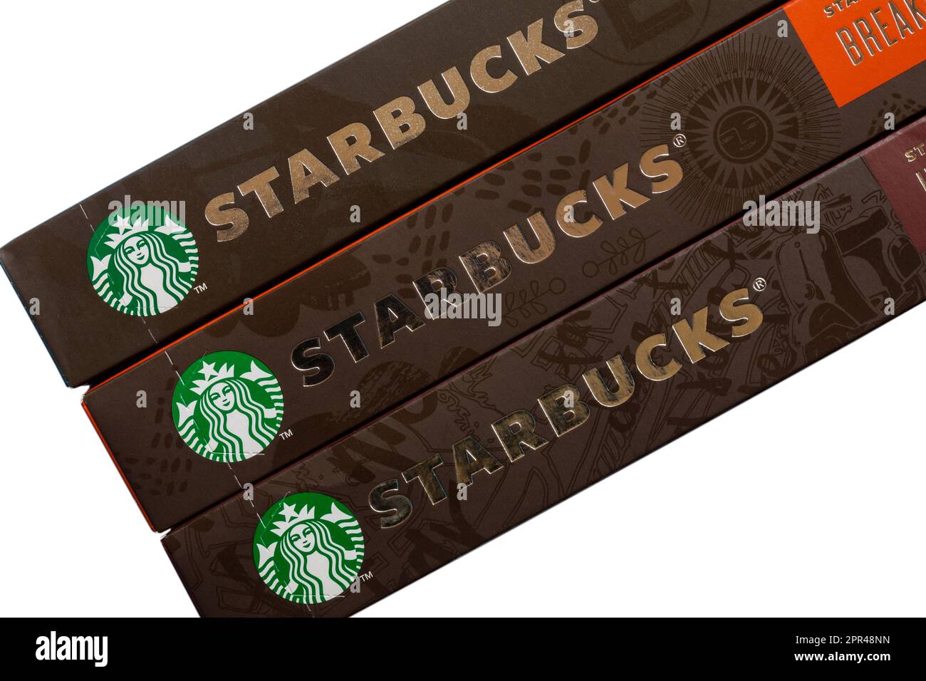Starbucks logo on boxes of Starbucks coffee capsules by Nespresso Stock Photo