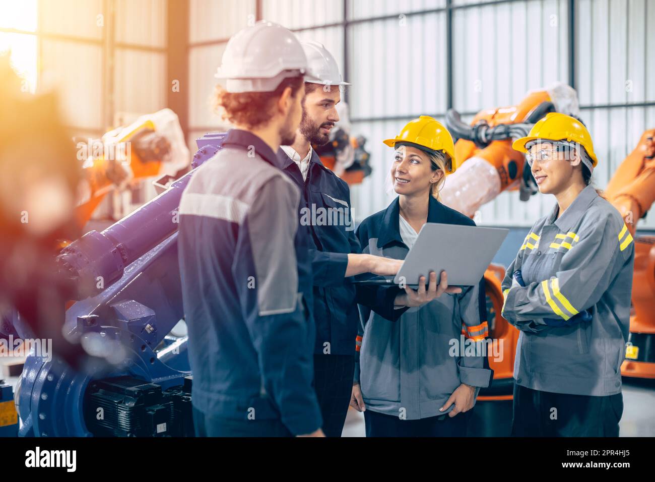 Group of engineer team stand talking together. Industry engineering