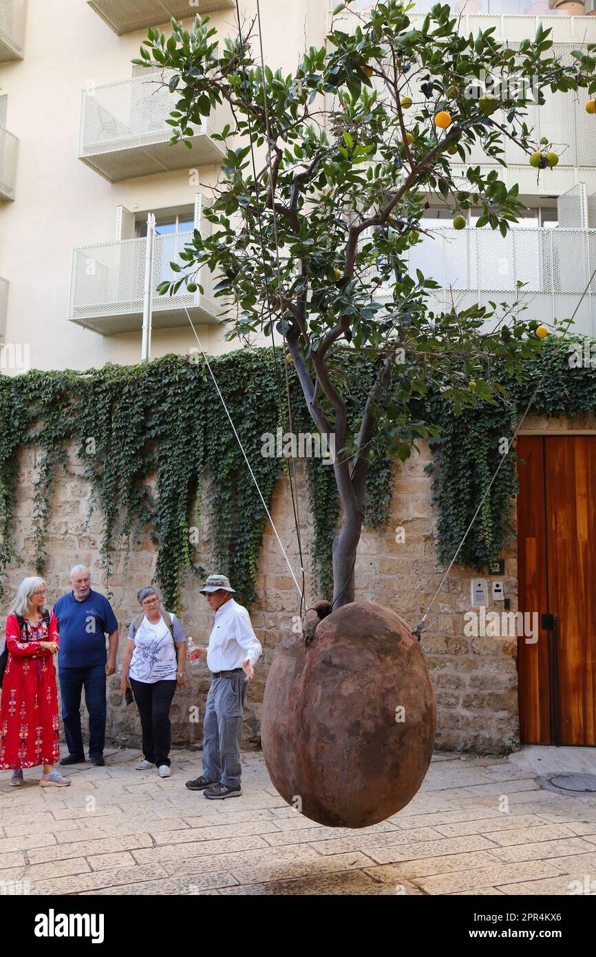 TEL AVIV, ISRAEL NOVEMBER 2, 2022 People visit famous hanging orange