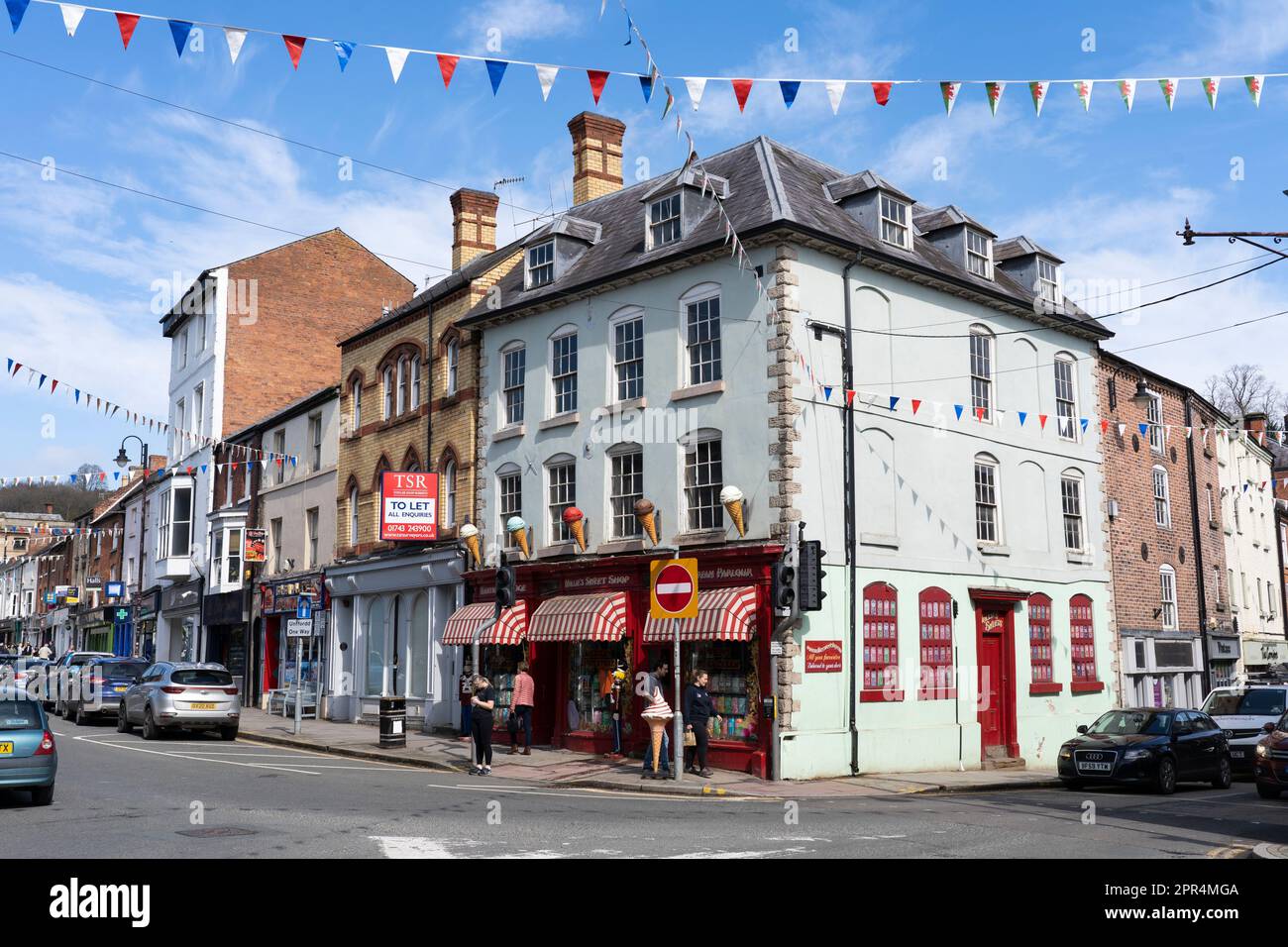 The colourfully decorated Mollie's Sweet Shop on Broad Street, Welshpool, the first branch opened in the sweet shop chain. Powys, Wales Stock Photo