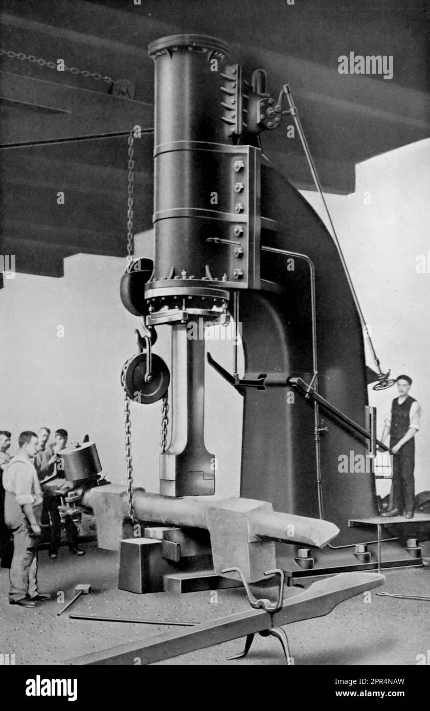 The early twentieth century is recalled as the age of mechanisation. Steam Hammer.  This was a time when man further developed the progress of the industrial revolution and learned to adapt the forces of nature to his own needs. This unattributed photograph is from the early twentieth century, and certainly no later than 1925. Stock Photo
