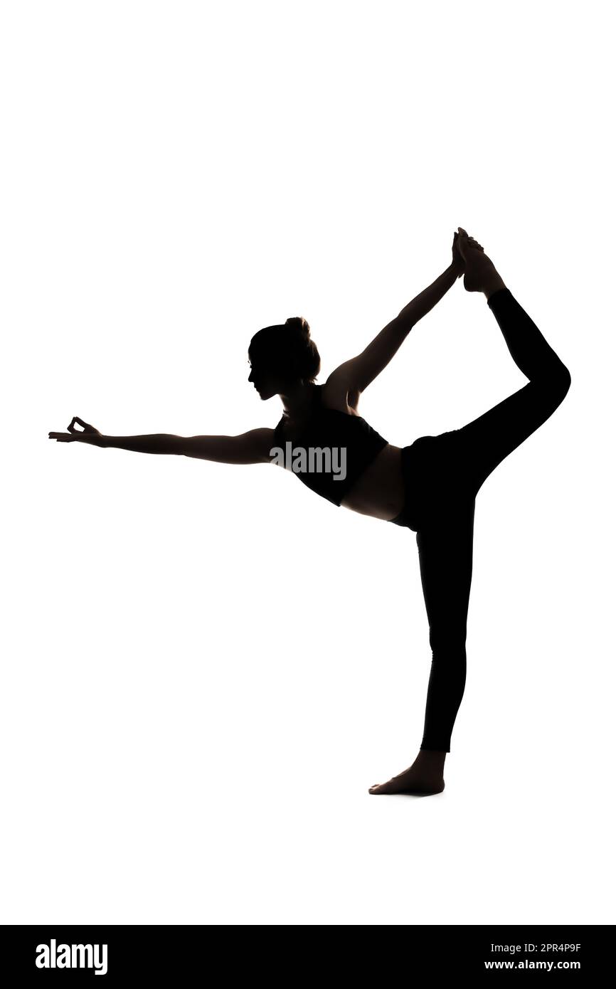 A silhouette of a woman doing yoga asana on a white background Stock