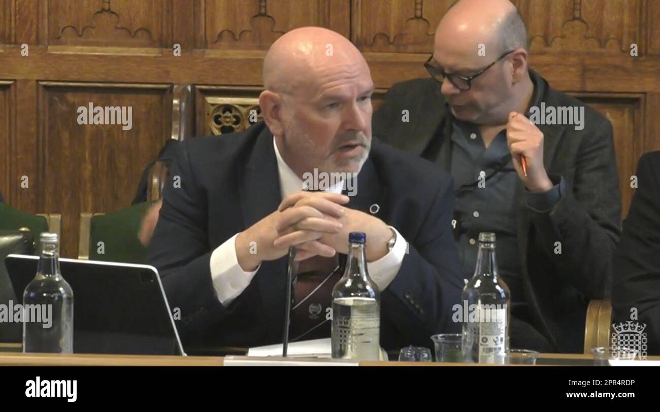 Mick Whelan, general secretary of the train drivers union Aslef, answering questions in front of the Transport Select Committee in the House of Commons, London, on the subject of minimum service levels for rail. Picture date: Wednesday April 26, 2023. Stock Photo