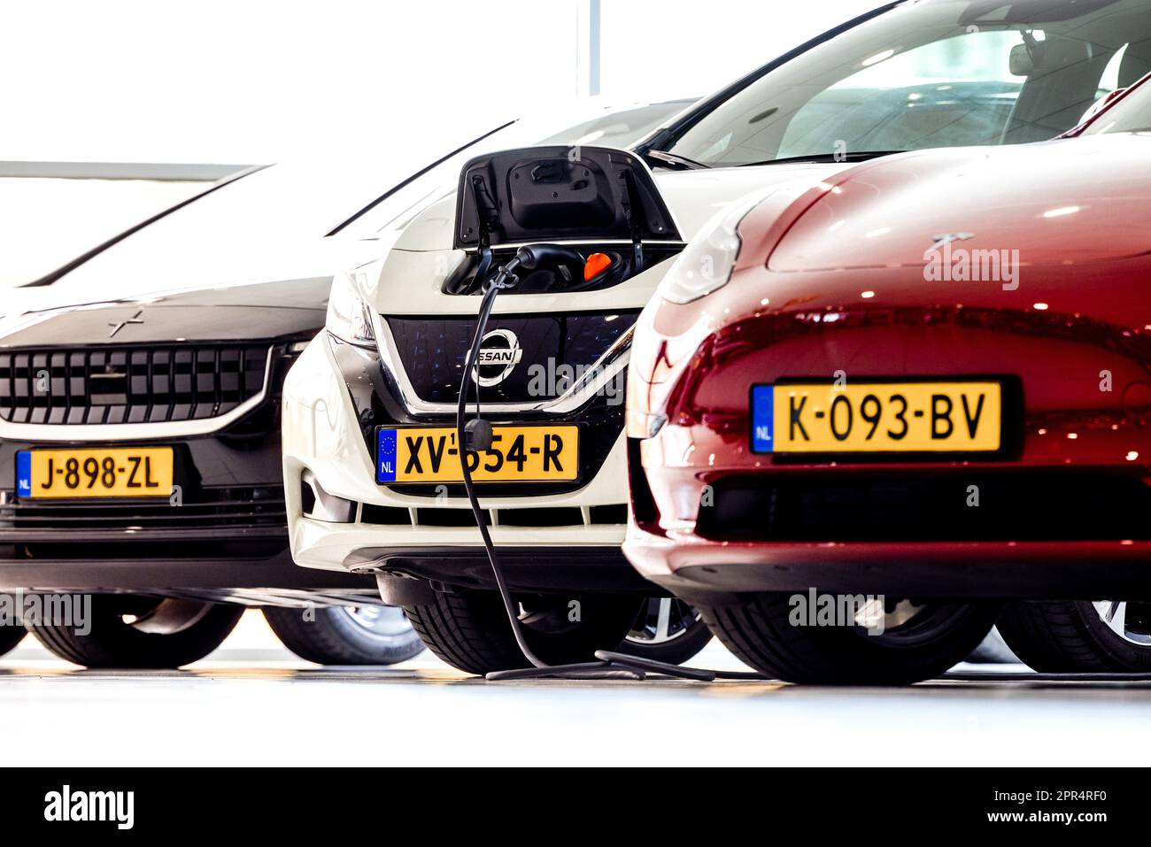 VEGHEL Secondhand electric cars in a Leaseplan showroom. To ensure