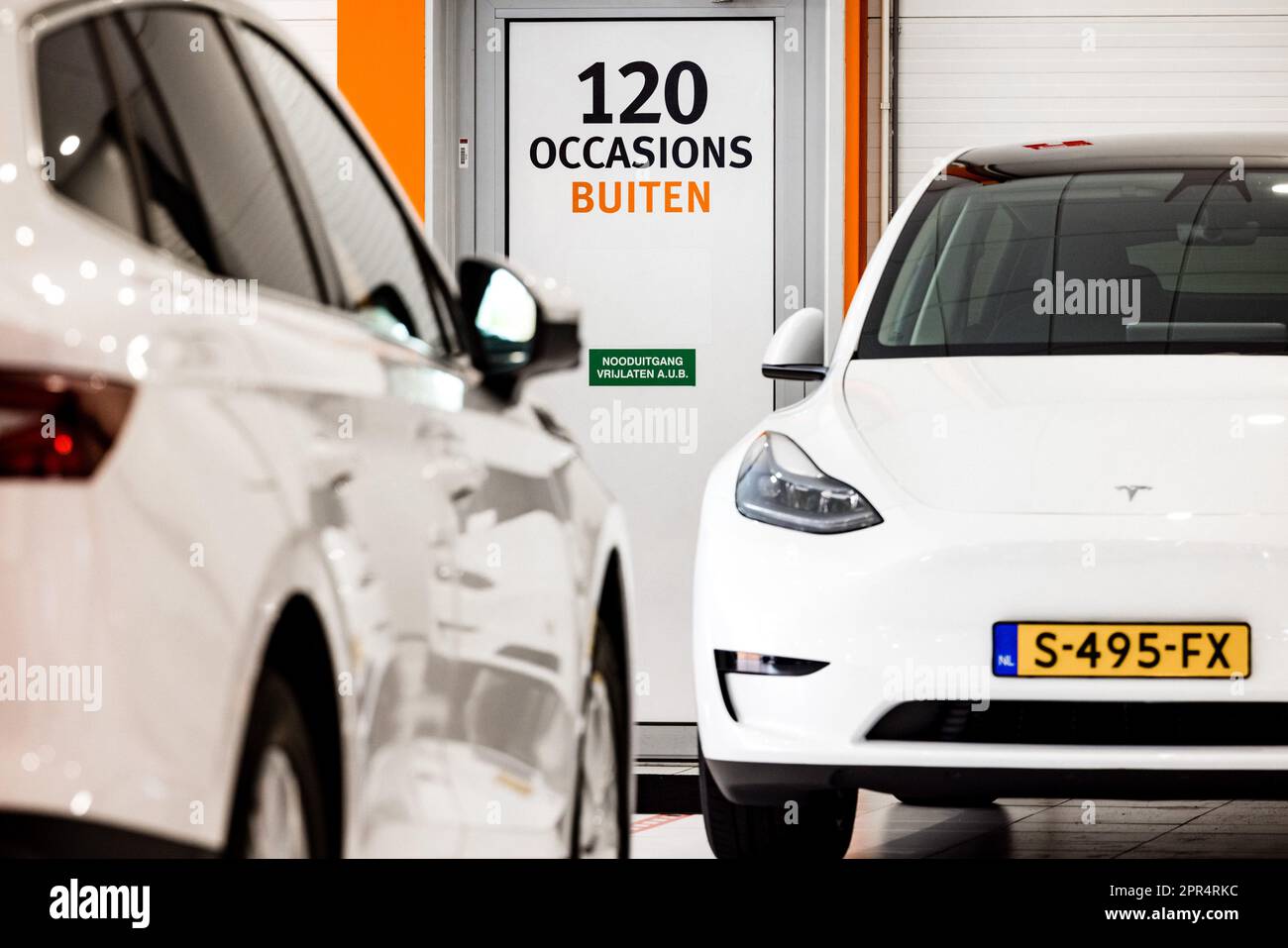 VEGHEL Secondhand electric cars in a Leaseplan showroom. To ensure