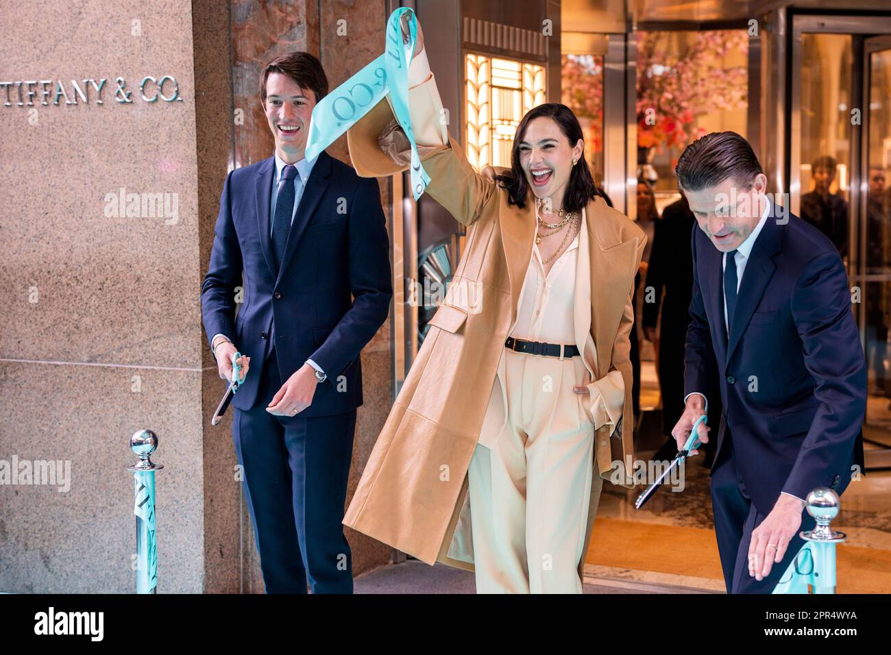 Alexandre Arnault, from left, Gal Gadot and Anthony Ledru participate in  the Tiffany & Co. Fifth Avenue flagship store grand re-opening ribbon  cutting ceremony on Wednesday, April 26, 2023, in New York. (