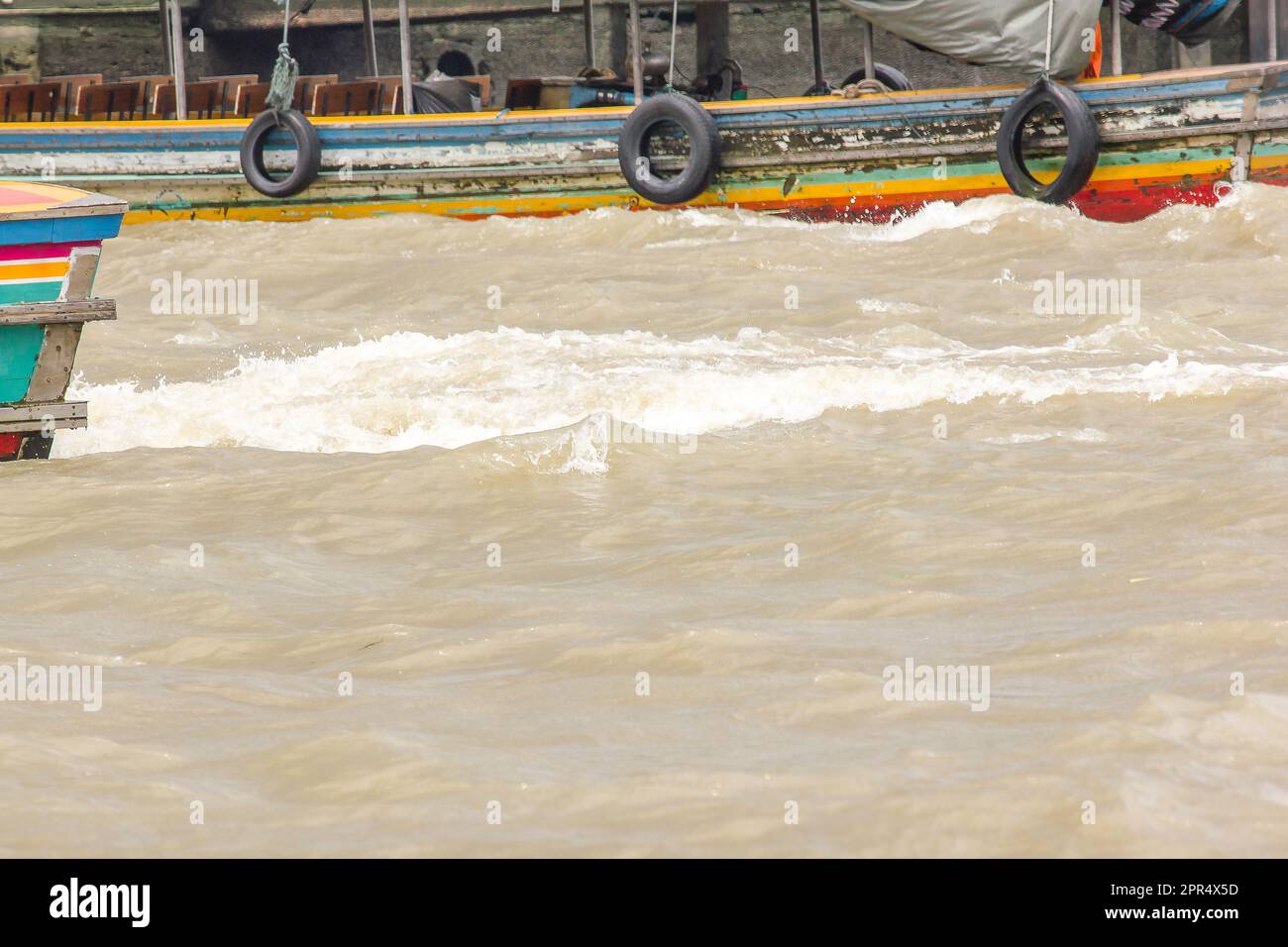 Water splashed from a speed boat in the river Stock Photo - Alamy