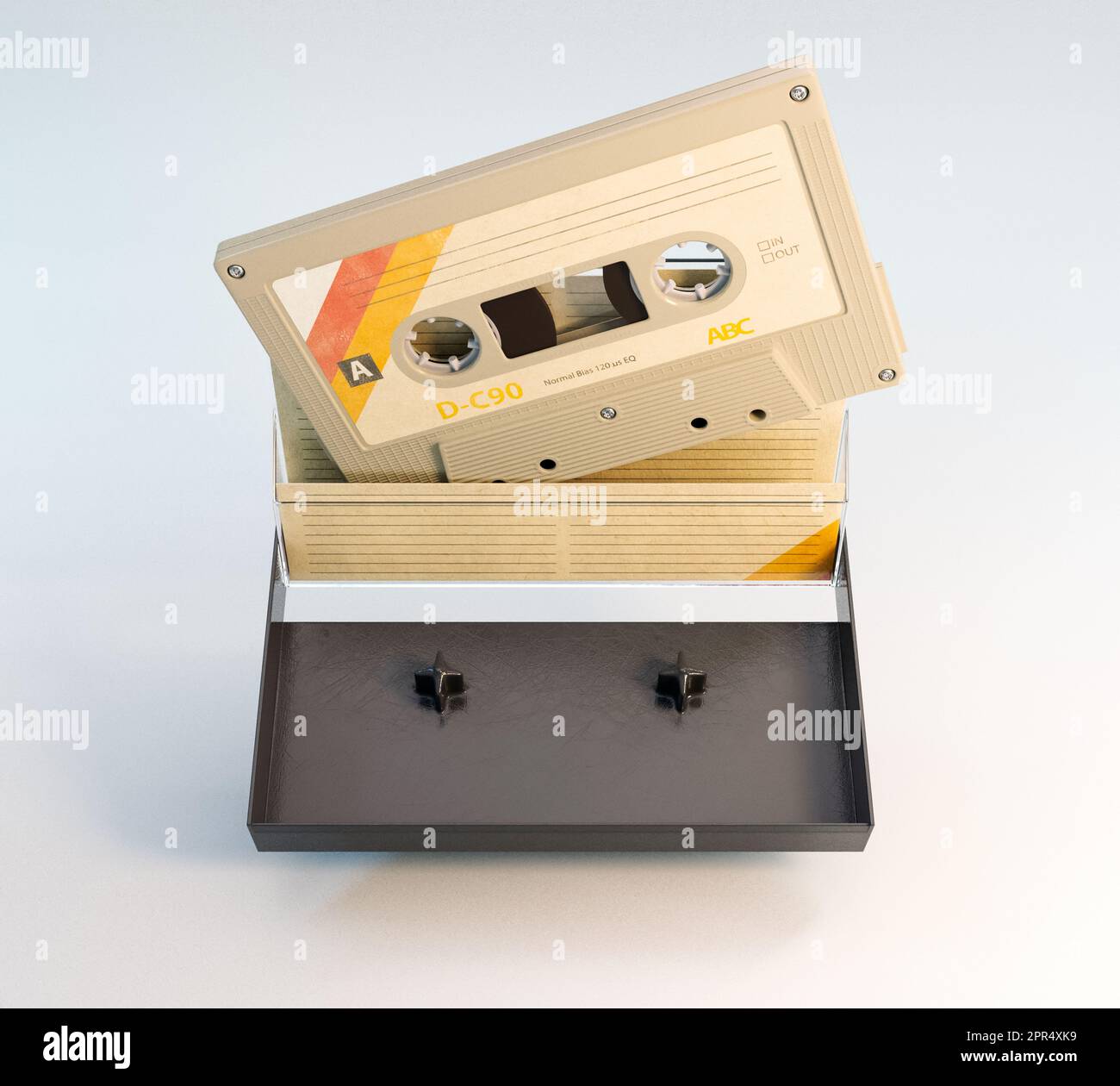 A concept of a recordable aduio cassette tape with a platic cover and cardboard insert - 3D render Stock Photo