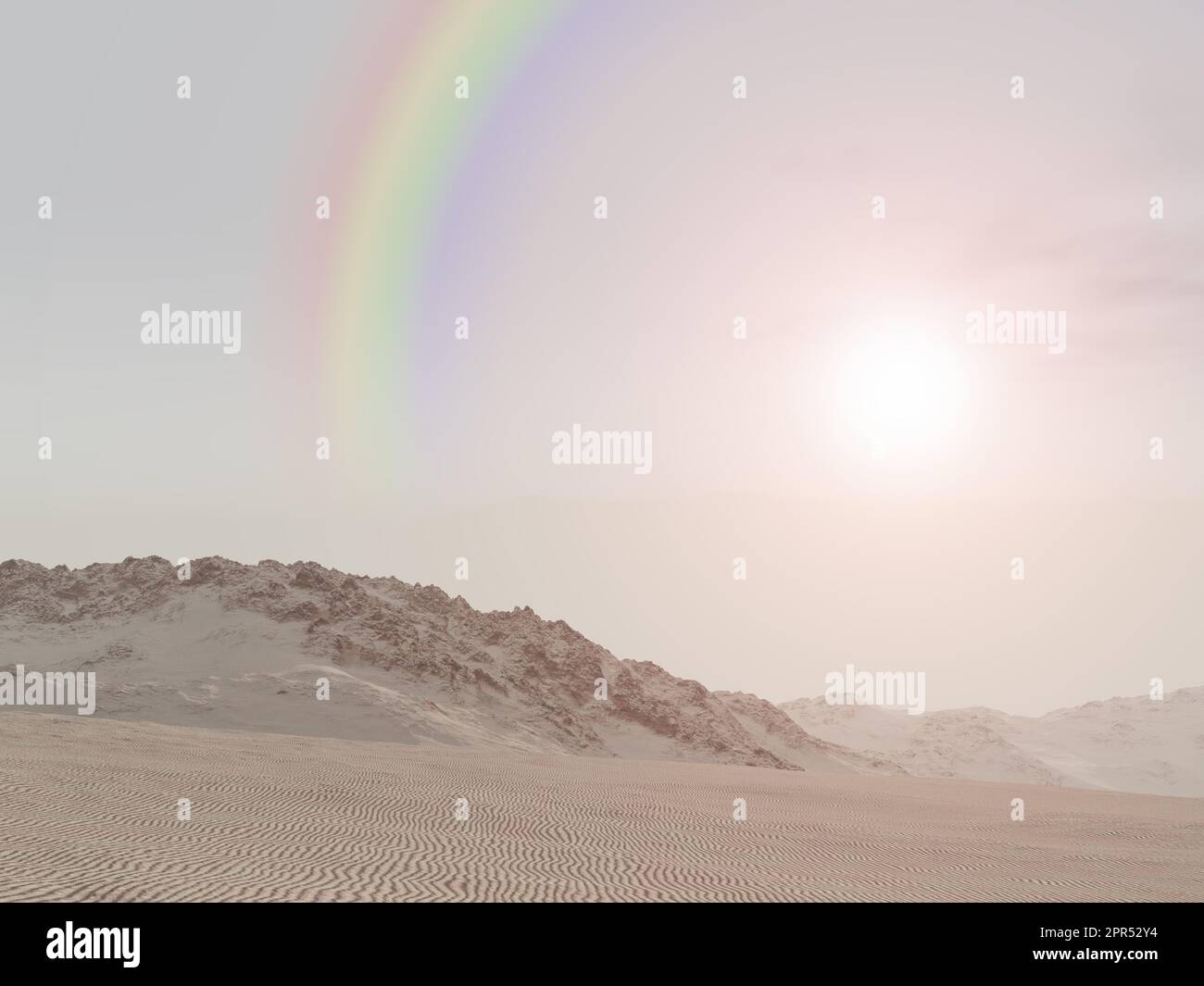 Rainbow over a desert landscape Stock Photo