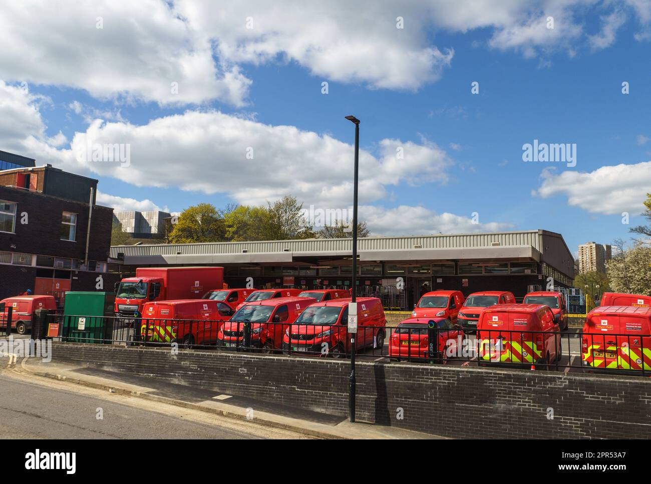 Royal Mail electric vehicles parked and charging at the Royal Mail