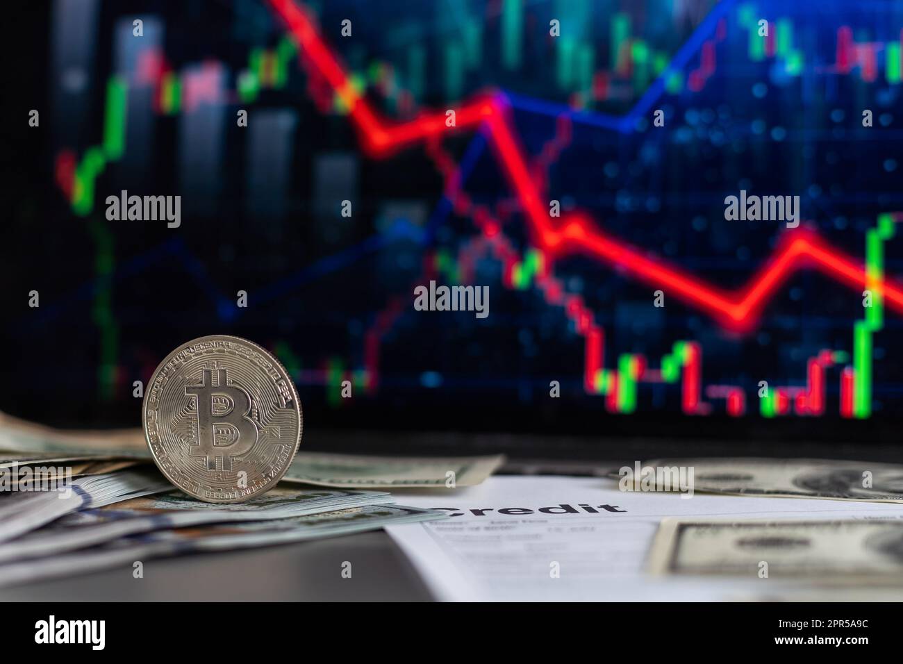 Bitcoin price is falling down and the entire crypto currency market is  loosing money. The graph evolution of this coin on a laptop screen with red  Stock Photo - Alamy