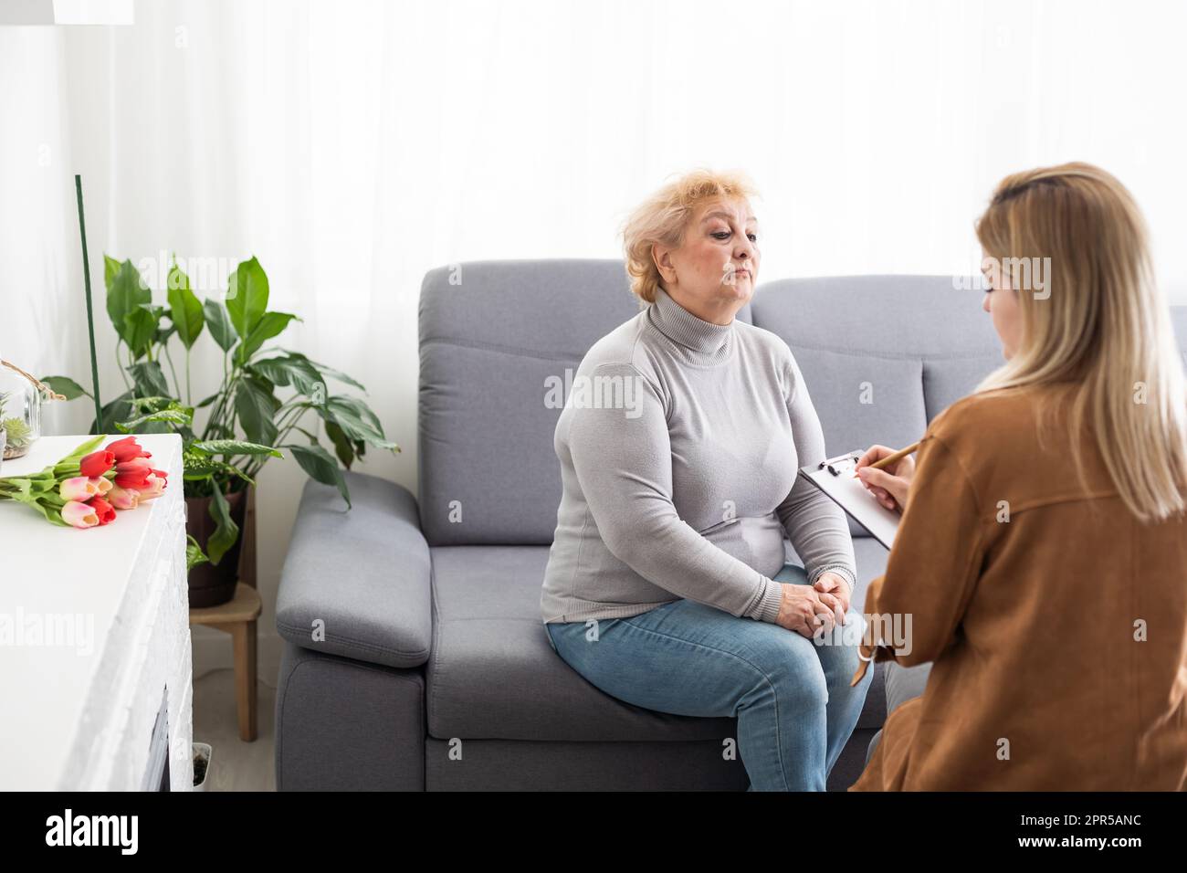 Psychology, depression. Suffering old woman, consulting with