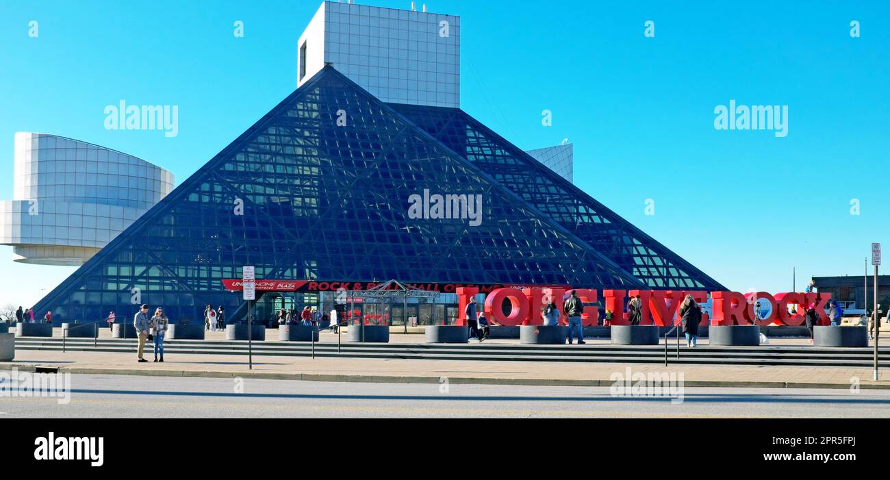 Visitors in the front plaza of the I.M. Pei designed Rock and Roll Hall of Fame and Museum in Cleveland, Ohio, USA on February 11, 2023. Stock Photo