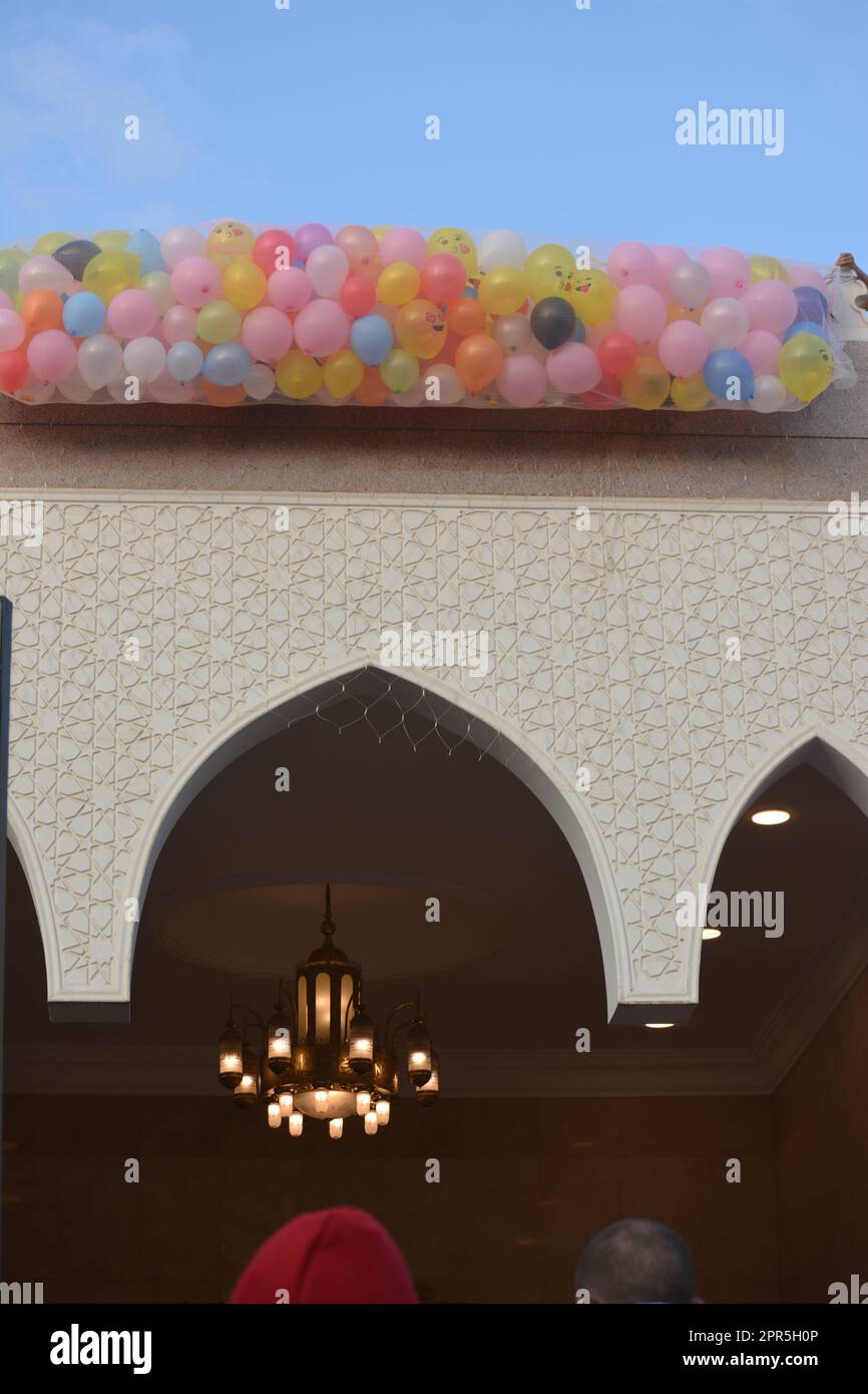 Cairo, Egypt, April 21 2023 Throwing balloons for kids and children