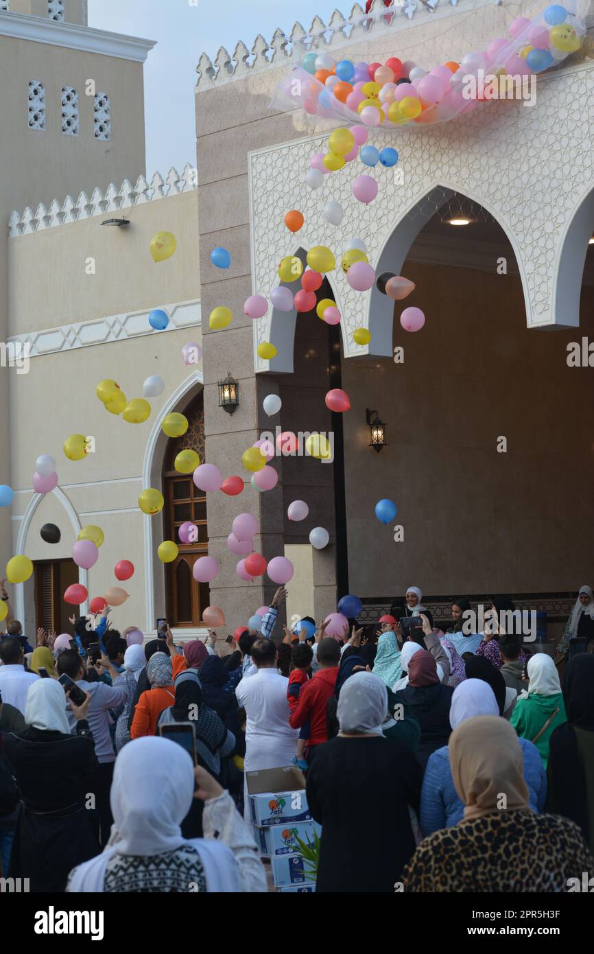 Cairo, Egypt, April 21 2023 Throwing balloons for kids and children